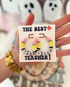 the best teacher bracelets are shown in front of a card that says, teachers