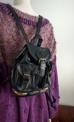 vintage 90s black leather mini rucksack with golden details. in Etsy shop! Vintage Everyday Shoulder Bag Backpack, Vintage Everyday Backpack, Retro Black Backpack Shoulder Bag, Vintage Leather Backpack With Adjustable Strap For School, Vintage Black Satchel Backpack, Black Vintage Satchel Backpack, Vintage Black Shoulder Bag Backpack, Grunge Travel Bag With Adjustable Strap, Grunge School Bag With Adjustable Strap