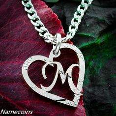 This is a very cute monogram necklace designed inside a double rim cut heart. This is a personalized, hand cut quarter slightly smaller than the half dollar. Notice that you can change which size you would prefer, depending on cost and preference. Also you may select from among the different sizes and lengths of our quality stainless steel necklace chains, a key chain, or a black cord! We now have new real silver quarters that are new and in mint condition! These are specialty coins that the min M Words Letter Design, M Letter Design, Couple Pillowcase, Monogram Printable, Monogram Cake, Stylish Alphabets, Love Wallpapers Romantic, Alphabet Images, M Letter