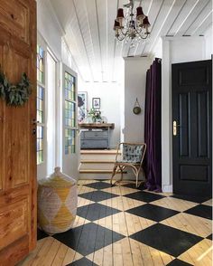 a black and white checkered floor in a house