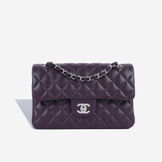 Sleek, refined and effortlessly chic, the Classic Small Flap Bag embodies Chanel’s non-traditionally feminine aesthetic. Crafted from a unique aubergine purple lambskin leather and complimented by silver hardware, there is nothing more beautiful than this. SPL Exterior Aubergine purple lambskin leather Silver tone hardware CC turn-lock closure Interwoven chain strap Rear slip pocket 2020 production Immaculate condition - no hardware sticker on CC Interior Matching leather interior Double flap Spacious compartment One slip pocket Chanel embossed leather logo Immaculate Comes with box, dustbag, card and receipt SPL Height 15cm Width 24cm Depth 7cm Classic Flap Bag, Future Lifestyle, Feminine Aesthetic, Timeless Handbag, Leather Silver, Classic Flap, Exclusive Bag, Flap Bag, Burberry Bag