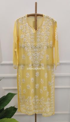 DESCRIPTION ▪ Fabric: Modal ▪ Sleeves: 3/4 Sleeves ▪ Style: Straight Kurti ▪ Length: 44-46 Inches ▪ Occasions: Casual Wear, Office Wear, Festive Wear ▪ Garment Care: Hand Wash Only ▪ Net Content: Only Kurti Long Sleeve Yellow Kurta With Cutdana, Yellow Long Sleeve Kurta With Cutdana, Spring Yellow Kurta With Cutdana, Spring Semi-stitched Salwar Kameez With Cutdana, Spring Semi-stitched Cutdana Salwar Kameez, Traditional Summer Dress With Cutdana, Summer Long Sleeve Georgette Traditional Wear, Designer Summer Kurta With Cutdana, Long Kurta With Chikankari Embroidery For Summer