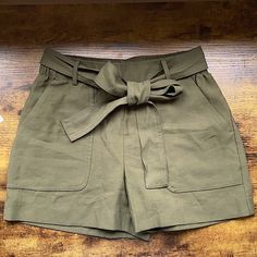 Unworn Olive Green Ties Waist Paper Bag Shorts. In Perfect Condition And Has Deep Pockets As Well. From A New Day (Target Brand). Green Ties, A New Day Target, Paper Bag Shorts, Target Brands, Green Paper, Green Tie, A New Day, New Day, Olive Green