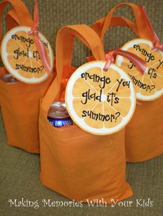 three orange bags with funny sayings on them