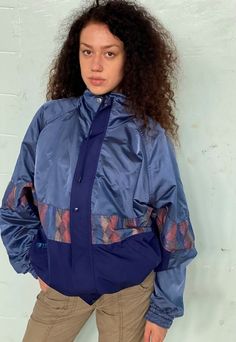 Vintage 80s Windbreaker Abstract print bomber jacket. Buttons up on collar, gathered bottoms, pockets, great condition. Size fits M. Length - 66 cm, bust - 140 cm. Browse our full collection for other matching items. Retro Nylon Windbreaker For Fall, Vintage Long-sleeve Nylon Track Jacket, Vintage Long Sleeve Nylon Track Jacket, Vintage Style Long Sleeve Nylon Track Jacket, 90s Style Nylon Track Jacket For Fall, 90s Nylon Track Jacket For Fall, Vintage Blue Nylon Track Jacket, Vintage Track Jacket With Pockets For Spring, 80s Windbreaker