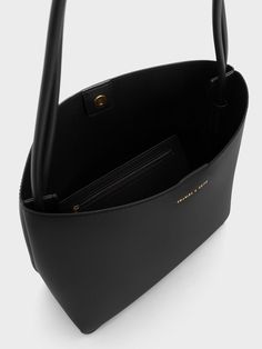 Black Leia Tote Bag | CHARLES & KEITH Eco-friendly Everyday Bucket Bag With Top Handle, Modern Everyday Recyclable Bags, Modern Recyclable Bags For Everyday Use, Modern Recyclable Tote Bag, Black Daily Tote Bucket Bag, Eco-friendly Rectangular Shoulder Bag For Everyday Use, Modern Recyclable Shoulder Bag For Shopping, Recyclable Double Handle Shoulder Bag For Daily Use, Eco-friendly Top Handle Bucket Bag For Everyday Use