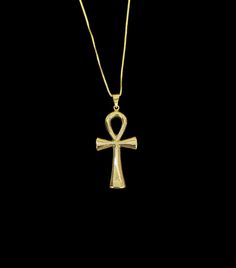 Hand-made in Egypt with love! The Ankh is one of the most recognizable symbols from ancient Egypt, known as "the key of life" or the "cross of life", and dating from the Early Dynastic Period (c. 3150 - 2613 BCE). It is a cross with a loop at the top sometimes ornamented with symbols or decorative flourishes but most often simply a plain gold cross. The symbol is an Egyptian hieroglyph for "life" or "breath of life" (`nh = ankh) and, as the Egyptians believed that one's earthly journey was only Symbolic Yellow Gold Cross Jewelry, Gold Ankh Necklace For Ceremonial Occasions, Gold Cross Necklace For Ceremonial Occasion, Spiritual 14k Gold Ankh Jewelry, 14k Gold Ankh Spiritual Jewelry, Luxury Gold Ankh Jewelry, Gold Ankh Jewelry For Anniversary, Elegant Ankh Yellow Gold Jewelry, Elegant Yellow Gold Ankh Jewelry