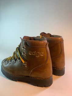 In amazing like new condition, these vintage Italian hiking boots are well built and made to last a lifetime. Italian made by Gaerne circa 1970's with Vibram Montagna souls and new original high durability laces, these Edge classics are sure to endure not to mention impress! Vintage Lace-up Boots For Outdoor Activities, Sturdy Leather Hiking Boots For Outdoor Activities, Sturdy Leather Lace-up Hiking Boots, Sturdy Lace-up Leather Hiking Boots, Rugged Hiking Boots With Leather Sole For Adventure, Rugged Sturdy Hiking Boots For Outdoor Activities, Sturdy Snip Toe Hiking Boots, Rugged Vintage Brown Boots For Outdoor, Rugged Waterproof Boots With Round Toe For Climbing