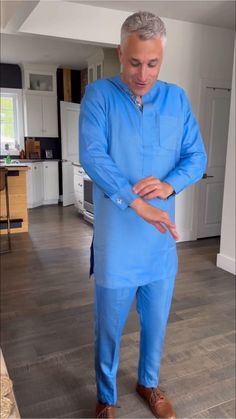 Experience the elegance of Nigerian fashion with our Luxury Sky Blue Agbada for Men, a custom-sized African suit ideal for weddings and special events. This exquisite piece of men's clothing combines traditional design with a modern twist, making it a perfect choice for those seeking a unique and culturally-rich attire. Key Feature: 👔 Tailored Elegance: Custom-sized for a perfect fit, exuding sophistication at every turn. 🎨 Vibrant Authenticity: Crafted with premium materials, boasting intricate African-inspired detailing. 🌟 Statement Piece: Elevate your style with this [luxurious] ensemble, commanding attention effortlessly. 💪 Comfort Redefined: Designed for [maximum comfort], ensuring you feel as good as you look. 🎉 Versatile Appeal: Perfect for weddings, celebrations, or any occasi Elegant Fitted Linen Kurta, Elegant Semi-formal Blue Traditional Wear, Elegant Blue Semi-formal Traditional Wear, Blue Semi-formal Suits For Eid, Blue Semi-formal Eid Suits, Blue Traditional Wear With Dabka For Groom, Fitted Blue Kurta For Groom, Blue Long Sleeve Traditional Wear For Groom, Traditional Blue Sets For Semi-formal Occasions