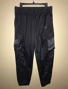 Nike Swoosh Windbreaker Sportswear Track Pants Women’s Medium Black NWOT. Brand New without tags! Never worn Track Pants Women, 95 Nike, Nike Swoosh, Pants Women, Nike Sportswear, Track Pants, Parachute Pants, Black Pants, Track