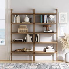 The Beacon 5 tier bookshelf (set of 2) is not just any wooden bookshelf - it's a boho masterpiece that combines rustic charm with practical design. Your eyes will be drawn to a stunning wire brushed finish that instantly adds a touch of warmth and style to your home office or living room. The solid wood frame not only ensures durability but also brings a sense of timeless elegance. You know this piece is built to last The Beacon bookcase features 5 spacious tiers, perfect for everything from your favorite novels to quirky collectibles. Each shelf panel is constructed with high quality MDF wrapped in real wood veneer to make sure it's sturdy enough to handle your heaviest hardcovers. And no need to worry about tipping -- it's designed to be mounted on your wall easily, making it as stable a Bookshelf Wall Mounted, Wall Mounted Bookcase, 5 Tier Bookshelf, Mansion Decor, Solid Wood Bookshelf, Bookshelf Table, Bookshelf Wall, Bookshelf Lighting, Home Library Rooms