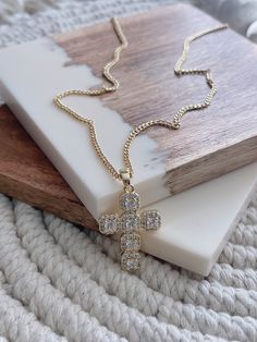 "All chains are 18k Gold filled , it's excellent quality Jewelry. ITEM  DETAILS:  * Material:  18k Gold Filled Chain 18k Gold Filled Charm  Nickel Free  Hypoallergenic                    * Size Chain:  16\"/18\"/20\"/22\" Length * Shipment: Free shipping.                      Everything Is made to order.                      Order preparation may tak 3 To 5                          business day. * Packaging: The jewels are packed and delivered in a beautiful packaging, ideal to give and surprise on special dates such as birthdays, graduations, Valentine's Day, Mother's Day, Women's Day, marriage, Christmas  In addition to this, the  Packaging bag in which the jewel arrives, will allow it to be kept separately for a longer duration. * Tips: The duration of your jewelry will depend on the ca Gold Cubic Zirconia Diamond Cut Chain Necklace, Gold Diamond Chain Necklace As Gift, Gold Diamond Cut Cross Necklace As Gift, Gold Pendant Cross Necklace Fine Jewelry, Gold Pendant Chain Necklace With Diamond Cut, Gold Cross Necklace With Diamond Cut As Gift, Gold Cross Diamond Necklace With Vvs Clarity, Gold Cubic Zirconia Cross Necklace As A Gift, Gold Diamond Cross Necklace As Gift