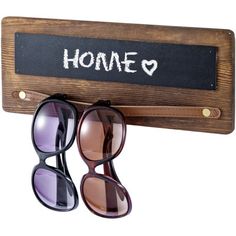 Featuring a burnt wood sunglasses holding rack with brown leatherette strap rail and chalkboard label sign, this sunglasses storage holder provides a stylish way to display and store your sunglasses, eyeglasses, and other eyewear at home or in a retail setting. The center leatherette strap rail provides plenty of room for hanging multiple pairs of sunglasses and eyewear while keep them from getting scratched. The chalkboard space could be used to write down messages to your friends and family at Sunglasses Organizer, Sunglasses Storage, Burnt Wood, Chalkboard Labels, Leather Organization, Wood Sunglasses, Bathroom Refresh, Curtain Accessories, Shelf Organization