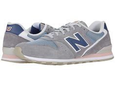 New Balance Classics 996 - Women's Classic Shoes : Gunmetal/Saturn : A modern take on an iconic silhouette, the New Balance Classics sneakers pair sleek colorways with a slim profile and reliable comfort. Casual shoes with a sporty, cushioned silhouette. Suede and mesh uppers for durable, breathable wear. Lace-up closure. Dual-density EVA midsole offers exceptional cushioning and stability. Rubber outsole provides traction and lasting durability. Imported. Measurements: Weight: 9.2 oz Product me Gray Sporty Sneakers With Perforated Toe Box, Gray Running Shoes With Translucent Outsole For Jogging, Modern Gray Mesh Sneakers, Gray Mesh Athletic Fit Sneakers, Mesh Running Shoes With Perforated Toe Box For Jogging, Gray Mesh Sneakers With Ortholite Insole, Modern Sneakers With Ortholite Insole For Jogging, Sporty Running Shoes With Perforated Toe Box For Jogging, Modern Mesh Sneakers With Cushioned Footbed