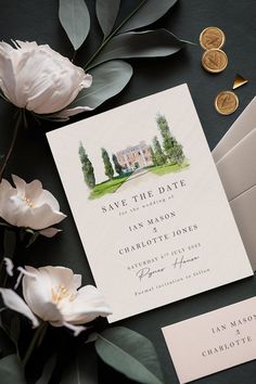 wedding stationery with white flowers and greenery