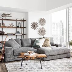 a living room filled with furniture and decor