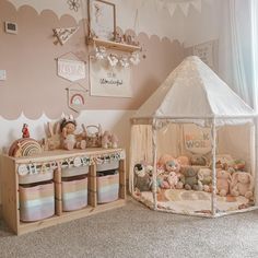 a child's room with teddy bears and toys on the floor, including a play tent