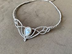 Moonstone macrame choker necklace tiara.With love 💜 Elegant Moonstone Jewelry For Festivals, Silver Macrame Jewelry For Festivals, Silver Macrame Jewelry For Festival, Handmade White Ethereal Necklace, Handmade Ethereal White Necklace, Adjustable Ethereal White Jewelry, Ethereal Handmade White Necklace, Bohemian Silver Macrame Jewelry, Handmade Mystical Choker For Festivals