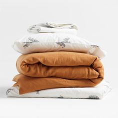 four pillows stacked on top of each other