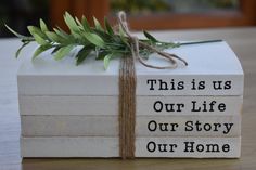 this is us our life our story our home book wrapped in twine and tied with string