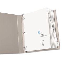 an open binder with several folders on the front and back pages, all in white