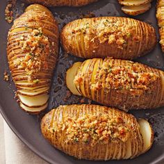 baked potatoes with toppings on a pan