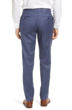 Fine Italian wool with a bit of stretch means a flexible fit in handsome dress pants in a clean flat-front cut. 37" inseam; 14 1/2" leg opening; 10 1/2" front rise; 17" back rise (size 32) Zip fly with button-tab closure Slant pockets; back button-welt pockets 99% wool, 1% spandex Dry clean Made in Canada Tailored Blue Dress Pants With Straight Hem, Blue Wool Bottoms For Workwear, Tailored Blue Wool Bottoms, Tailored Wool Blue Bottoms, Tailored Blue Bottoms With Straight Hem, Tailored Flat Front Suiting Fabric Bottoms, Blue Formal Bottoms With Straight Hem, Classic Blue Bottoms With Pressed Crease, Tailored Flat Front Blue Pants