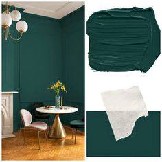 a dining room with dark green walls and white furniture, along with a gold chandelier