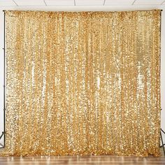 a gold sequin backdrop on a white background