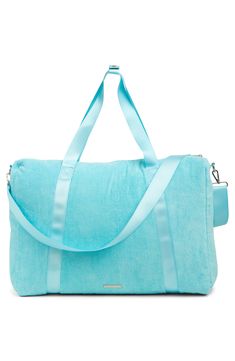 Stay stylish when traveling. The roomy interior of this Madden Girl weekend bag fits some of your favorite outfits and toiletries. - Dual top handles- Detachable, adjustable shoulder strap- Top zip closure- Exterior features slip pockets and bottom zip pocket- Interior features media pockets and zip wall pocket- Approx. 11" H x 19" W x 9.5" D- Approx. 12" handle drop, 19-30" strap drop - Imported Textile exterior and lining Weekender Tote Bag With Adjustable Handle For Travel, Adjustable Handle Tote Weekender Bag For Travel, Travel Weekender Tote With Adjustable Handle, Travel Weekender Bag With Adjustable Handle, Weekend Tote Bag With Adjustable Strap, Travel Bag With Adjustable Double Handle, Blue Tote Weekender Bag For Overnight Trips, Weekend Bags With Adjustable Strap And Double Handle, Tote Weekender Bag With Adjustable Strap For Overnight Trips