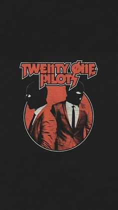 two men in suits with the words twenty and one pilot on their chest, standing next to each other