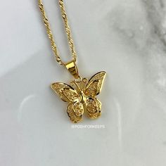 DESCRIPTION: Part of our exclusive "The Butterfly Effect Collection", the high polish 18K Gold Plated Butterfly Wish necklace features a double 3D butterfly design with beautifully crafted delicate details. It is the perfect piece to compliment any look! LENGTH: Multiple chain sizes available for selection above. Pendant: 0.8 inch. MATERIAL: 18K Gold Plated over Stainless Steel. Hypoallergenic, Tarnish Free and Water Resistant. Mix and match with any of our 18K Gold Necklaces and Anklets to crea Gold Plated Butterfly Charm Pendant Necklace, Gold Plated Butterfly Necklace As Gift, Gold-plated Gold Butterfly Necklace, Gold-plated Butterfly Necklace, Gold Plated Butterfly Necklace For Gift, Gold Plated Butterfly Necklace With Charm, Elegant Gold Butterfly Necklace, Yellow Gold Plated Butterfly Necklace, Gold Butterfly Necklace For Gift