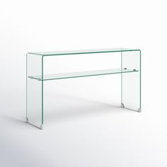 This stunning Meyerson console table makes a dramatically modern statement. Elegant and ethereal, Meyerson’s rounded corners soften its stark lines, and its grey glass frame creates a luxe look that heightens any room’s aesthetic. One shelf provides sufficient storage or display in the hall or entryway. AllModern Color: Clear AllModern Meyerson 53" Console Table in Clear | Size 29.5" H X 53" W X 13.8" D Glass Frames, Grey Glass, Round Corner, Accent Furniture, All Modern, Console Table, Home Furniture, Home And Garden, Shelves