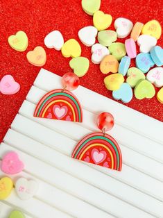 Feel fashionable and glamorous with these classic acrylic rainbow heart dangle earrings. 2"L Lead & Nickel Compliant Cheap Trendy Multicolor Heart Earrings, Cheap Cute Multicolor Heart Earrings, Cheap Multicolor Heart Dangle Earrings, Cheap Multicolor Dangle Heart Earrings, Heart Dangle Earrings, Some Text, Rainbow Heart, Dangle Earrings, Rainbow