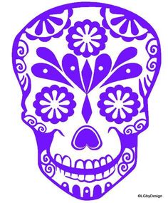 a purple sugar skull with flowers on it