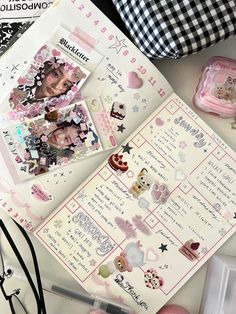 the contents of a scrapbook are laid out on a table with scissors and other items