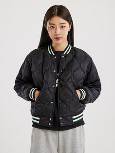 Editor's notesIt is a relaxed fit and trendy varsity jacket for unisex. The jacket is easy to match with any items and make casual outfit. The quilted puffer fabric adds volume and keeps warmth. The jacket has snap button closure and logo patch on the sleeve.F- Relaxed fit- Ribbed neck, cuffs, hem- Stripe point- Side pocketsMeasurements(in.)W(Women One Size) / M(Men One Size)- Length: 18.9 in. / 21.7 in.- Chest: 20.7 in. / 24.8 in.- Hem: 21.9 in. / 25 in.- Sleeve Length: 23.8 in. / 27.4 in.Compo Streetwear Cotton Puffer Jacket With Padded Collar, Casual Puffer Windbreaker For Streetwear, Sporty Puffer Outerwear For Streetwear, Sporty Streetwear Puffer Outerwear, Urban Quilted Jacket For Streetwear, Sporty Quilted Puffer Jacket, Sporty Quilted Outerwear For Streetwear, Casual Quilted Outerwear For Streetwear, Sporty Streetwear Puffer Jacket With Ribbed Cuffs