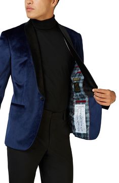 Get ready for your next big event in this suit jacket made from opulent velvet with a silky shawl collar. Shawl collar Lined 100% polyester Machine wash, line dry Imported Tailored Velvet Tuxedo Outerwear, Velvet Tuxedo Blazer With Suit Collar, Velvet Tuxedo Style Blazer For Semi-formal Events, Velvet Tuxedo Style Evening Outerwear, Evening Velvet Blazer With Suit Collar, Tailored Velvet Tuxedo Blazer, Velvet Tuxedo Blazer With Notch Lapel, Velvet Notch Lapel Suit For Evening, Formal Fitted Velvet Outerwear