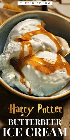 Homemade butterbeer ice cream featuring a creamy base infused with butterscotch and vanilla flavors, swirled with caramel, and topped with whipped cream for a magical and delicious treat inspired by the Wizarding World.