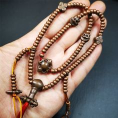 ❤This mala was collect from Hepo Town Baiyu County Tibet, blessed in Yaqing Monastry.It is made of copper,brown color,length is 44cm / 18",has 1 Kartika ,2 skeletons, 2 stamp pendant, and 2 strings of counters with phurba + kartika.❤DETIALS100% HandmadeMaterial:red copperSize:Mala'perimeter is 44cm,18 inches.108 bodhi beads: 5mm ,about 0.2"1 kartika:2.7cm ,about 1.1"2 skull beads:1.1cm * 1.1cm ,about 0.43" * 0.43"2 counters: 6cm long, about 2.36"❤ Great Mala For Meditation and Yoga Practitioners Traditional Brown Jewelry For Blessing, Bronze Spiritual Necklaces For Rituals, Spiritual Copper Necklace For Meditation, Hand-strung Brown Necklaces For Rituals, Brown Necklace With 108 Beads For Festivals, Brown Hand-strung Necklaces For Rituals, Adjustable Copper Spiritual Necklaces, Spiritual Adjustable Copper Necklace, Bronze Spiritual Necklaces For Festivals