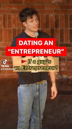 a man standing in front of a brick wall holding a microphone with the words dating an entrepreeur if a guy's an entertainment?