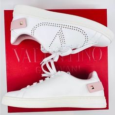 Backnet Sneakers In White Calf Leather. An Accessory That Goes On The Feet. Featuring A Round Toe, A Lace Fastening, Rockstud Embellishments And A Perforated Style. Composition Outer: Calf Leather 100%, Polyester 100% Lining: Calf Leather 100%, Polyester 100% Sole: Rubber 100% Bnwt Sneakers Come With Original Red Valentino Box And Duster Bag. Runs True To Size. Baskets Valentino, Valentino Garavani Shoes, Pink Sneakers, Red Valentino, Valentino Garavani, Womens Shoes Sneakers, Calf Leather, Embellishments, Shoes Sneakers