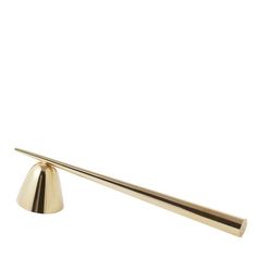 a brass metal object with a long handle on the end, against a white background