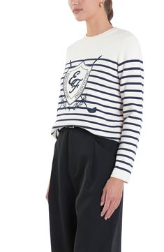 Layer up for the in-between seasons in preppy style with this knit top punctuated by laurel embroidery around the logo patch. Crewneck Long sleeves Ribbed cuffs and hem Side slits 52% rayon, 29% polyester, 19% nylon Hand wash, dry flat Imported Laurel Embroidery, Navy Collegiate Crew Neck Top, Nautical Cotton Crew Neck Top, Navy Crew Neck Top With Logo Detail, Navy Horizontal Stripe Crew Neck Top, Patch Crewneck, Sailor Striped Long Sleeve Top, Long Sleeve Knit Top, The In Between