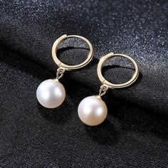 Whatsapp/SKU/Product code : R1905111009 Base metal : Yellow Gold( All our metals are skin friendly will not cause any Allergies) Metals Type: Yellow Gold Shape \ pattern: Round Metals Type: 18K Solid Yellow Gold Earring Type : Hoop Earrings Main Stone: Pearl Pearl Type:Freshwater Pearls Earring size: 20mm*7mm Side Stone Size: 6.5-7mm Gem Quantity:65 Cut: Round Color: White Metal Type: 18k Yellow Gold Gram Weight :1.60g Please read the dimensions carefully before placing an order For reference on Minimalist Tarnish-resistant Round Pearl Earrings, Formal Minimalist Hoop Pearl Earrings, Minimalist Hoop Pearl Earrings For Formal Occasions, Formal White Gold Hoop Pearl Earrings, White Gold Hoop Pearl Earrings For Anniversary, Classic Silver Huggie Pearl Earrings, Classic White Drop Huggie Earrings, Classic Silver Hoop Pearl Earrings, Elegant Hoop Pearl Earrings Tarnish Resistant