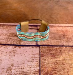 Hand beaded bracelet with leather ends. Concho with hook closure. Pink and turquoise pattern. Turquoise Pattern, Hand Beading, Beaded Bracelet, Jewelry Bracelets, Beaded Bracelets, Turquoise, Ships, Bracelet, Leather