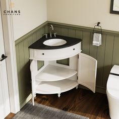 a white sink and toilet in a small room