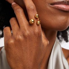 Bring your distinctive style to the forefront with this Soko Obiti Statement Ring. Brass with 24K gold plate Showcases three curved ribbons punctuated in multi-sized polished ball ends Handcrafted by artisans in Kenya using traditional techniques Designed for and exclusively available at Zales Cheap Statement Gold Midi Rings, Cheap Statement Rings In Yellow Gold, Brass Jeqelry, Cheap Yellow Gold Statement Rings, Gold Dress Rings, Statement Rings Unique, Domed Ring, Black Women Art, Traditional Techniques