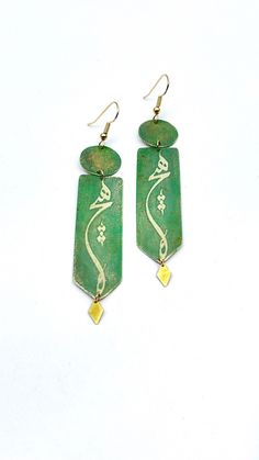 "brass earrings, limited edition  A word from Masterpiece poetry from Molana. Heech: Nothing (The utmost state of purification from all the layers of one's identity, the highest state of love when the lover has completely dissolved in the beloved, annihilated), green color is fixed. Size: 2 5/8\" X 5/8\" and very lightweight" Gold Earrings With Patina As A Gift, Green Brass Earrings As Gift, Artisan Earrings With Patina As Gift, Gold Earrings With Patina For Gift, Artisan Earrings With Patina For Gifts, Green Brass Earrings For Gift, Artisan Patina Earrings As A Gift, Artistic Green Earrings For Festival, Bronze Patina Earrings For Gift