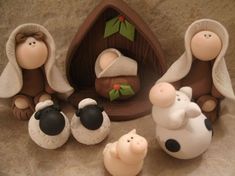 a nativity scene with three small figurines